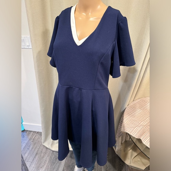 Charlotte Russe Dresses & Skirts - PTP 22 inches with stretch 38 inches in length navy dress crisscross back